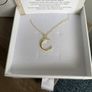 "Little Light". Gold crescent moon pendant. Image 4