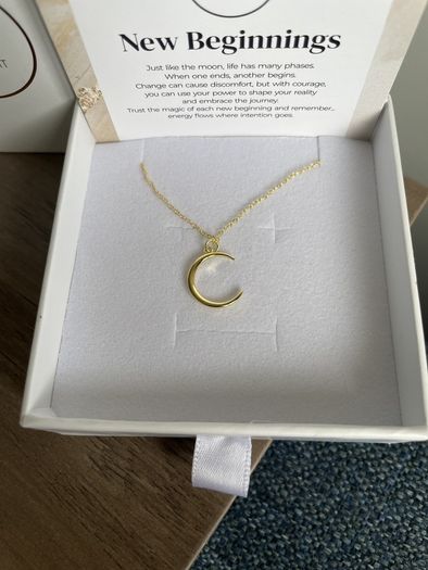 "Little Light". Gold crescent moon pendant.