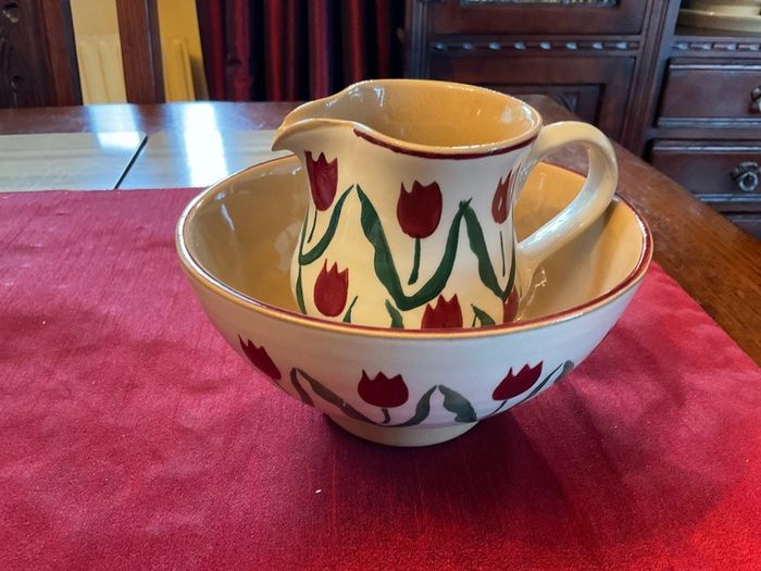 Nicholas Mosse Red lawn set of two , 4 inch jug and a 6 inch diameter bowl . Both have blemishes but perfect for  display