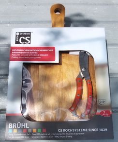 Solid wood chopping board with bone breaker.