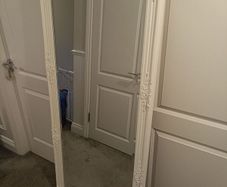 Large white, baroque style, ornate full length mirror