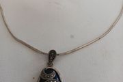 silver chain and pendant
