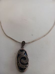 silver chain and pendant