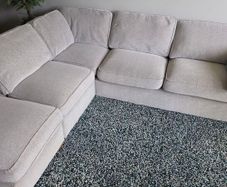 Light grey fabric corner sofa