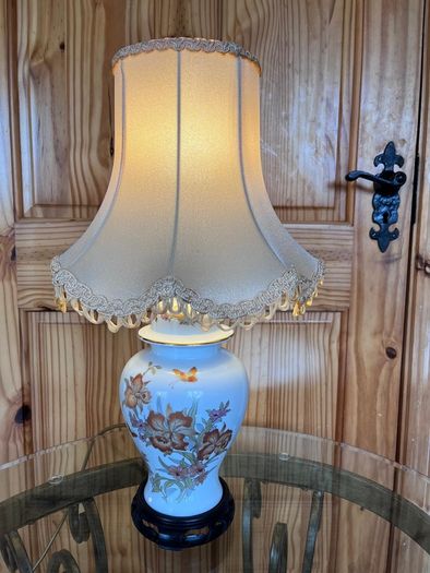 Ceramic lamp 65 euro. Brass with glass shade 95 euro . Chinese style 50 euro .