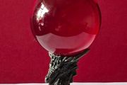 Red crystal/glass ball and metal dragon stand.