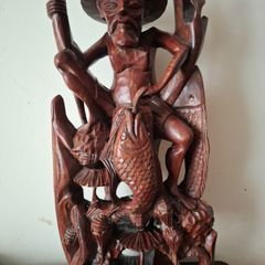 Hand carved wooden Balinese sculpture Fisherman