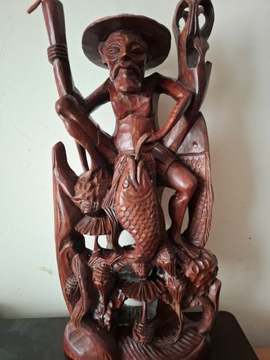 Hand carved wooden Balinese sculpture Fisherman