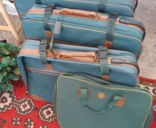 Four Matching Suitcases