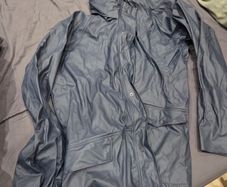 Waterproof jacket and trouser over alls
