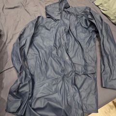 Waterproof jacket and trouser over alls