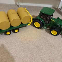 Bruder John Deere Toy Tractor and Trailer with hay bales