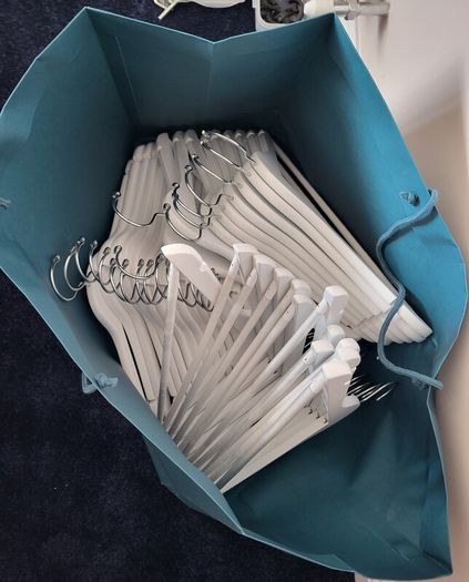 White wooden hangers