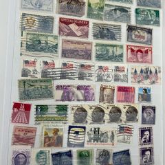 An Post Irish 16 Page Stamps Stock Book with used stamps from America to Cayman Islands