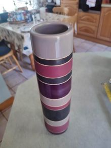 Lovely tall vase  handcrafted slight variations occur giving each product its own uniqueness.