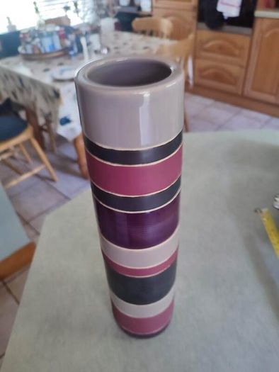 Lovely tall vase  handcrafted slight variations occur giving each product its own uniqueness.