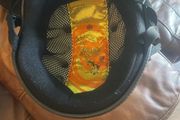 Two child's horse riding helmets