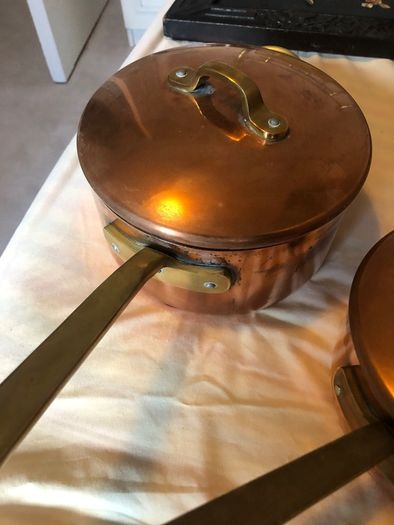 Vintage castle copper saucepans