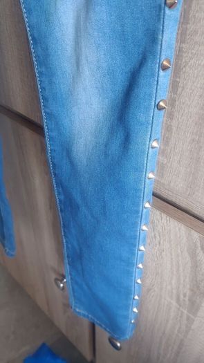 New koucla jeans with studs size small