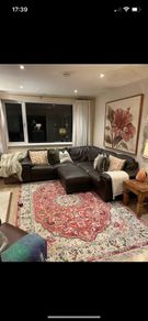 brown leather L shaped sofa