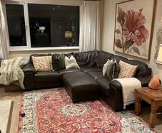 brown leather L shaped sofa
