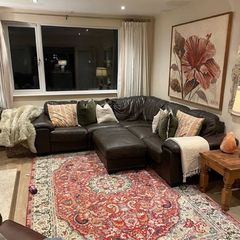 brown leather L shaped sofa