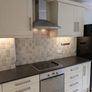 kitchen cabinets and worktop Image 4