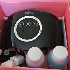 nail lamp and gel polish and nail tips
