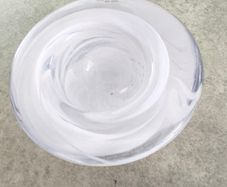 A Small Kosta Boda Art Glass Bowl with White Swirl Detail