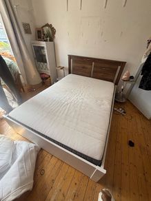 double bed and mattress with under bed storage