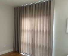Wave fold curtain and slim line ceiling track