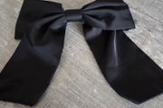 black  bow hair clip. Simple, elegant and stylish design, perfect for everyday wear or special occasions. Like new never used