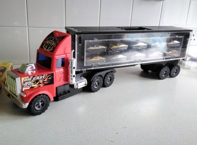 Model large plastic model truck with car trailer and ten cars on one side