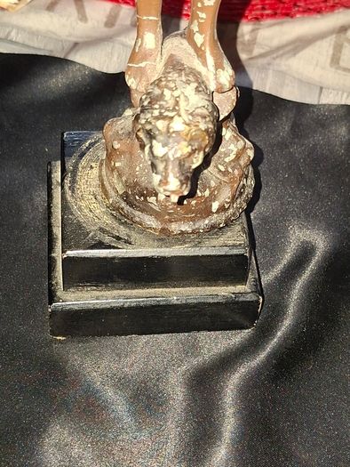 A Pair of Antique French Spelter Statues titled La Force (The Strength) and Le Pouvoir (The Power). The feature a male and female figure standing a top lions, raising up flaming torches
