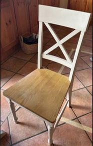 Four oak chairs.