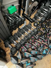Hex rubber dumbbells and cast iron kettlebells