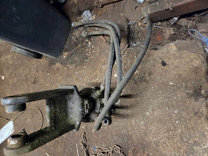 Hydraulic rotator for a grab bucket