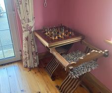 Chess Table with one chair and pieces