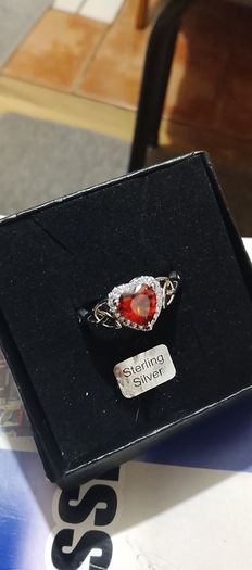 Silver Celtic twist ruby stone ring