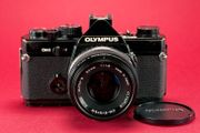 Olympus OM 2  film camera (read)