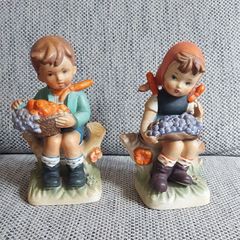 2 large Hummel style figurines