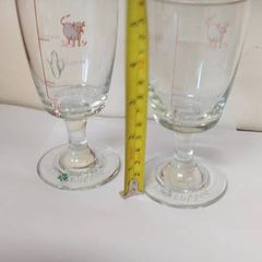 2 x irish coffee glasses,,,used condition some fading on writing,,see pictures for condition,buyer collects.