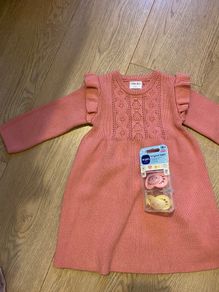 Baby dress and soothers