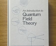An Introduction to Quantum Field Theory by Michael E. Peskin & Daniel V.Schroeder