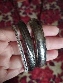 Beautiful bracelets in silver tone.
