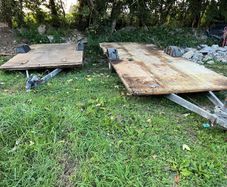 Trailer axle or trailer base