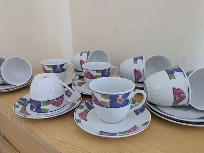 Germany porcelain(WINTERLING) tea set for 12 person, contains 24  pcs, including 12 tea cups and 12 saucers. Brand new, never used.