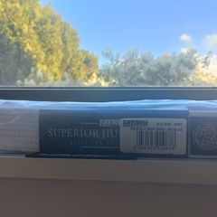 White adult jiu-jitsu belt