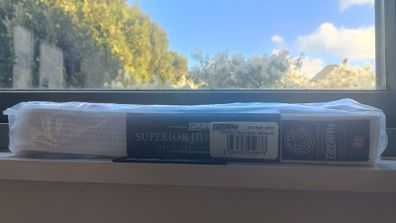 White adult jiu-jitsu belt