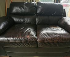 2 x two seater brown faux leather couches